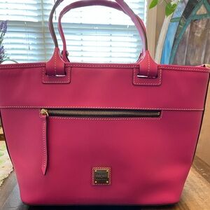 Dooney and Bourke fuchsia vintage purse. Never been used/brand new condition.